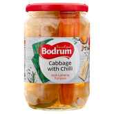 A jar of Bodrum - Cabbage with Hot Pepper - 670g contains pickled cabbage and carrots, distinguished by its red lid and a product label displaying herbs and spices.